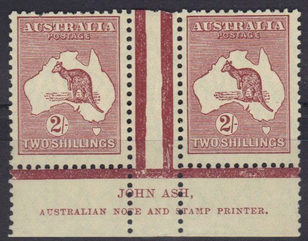 2/- maroon John Ash imprint pair MLH. Pulled perf ... Image 1++