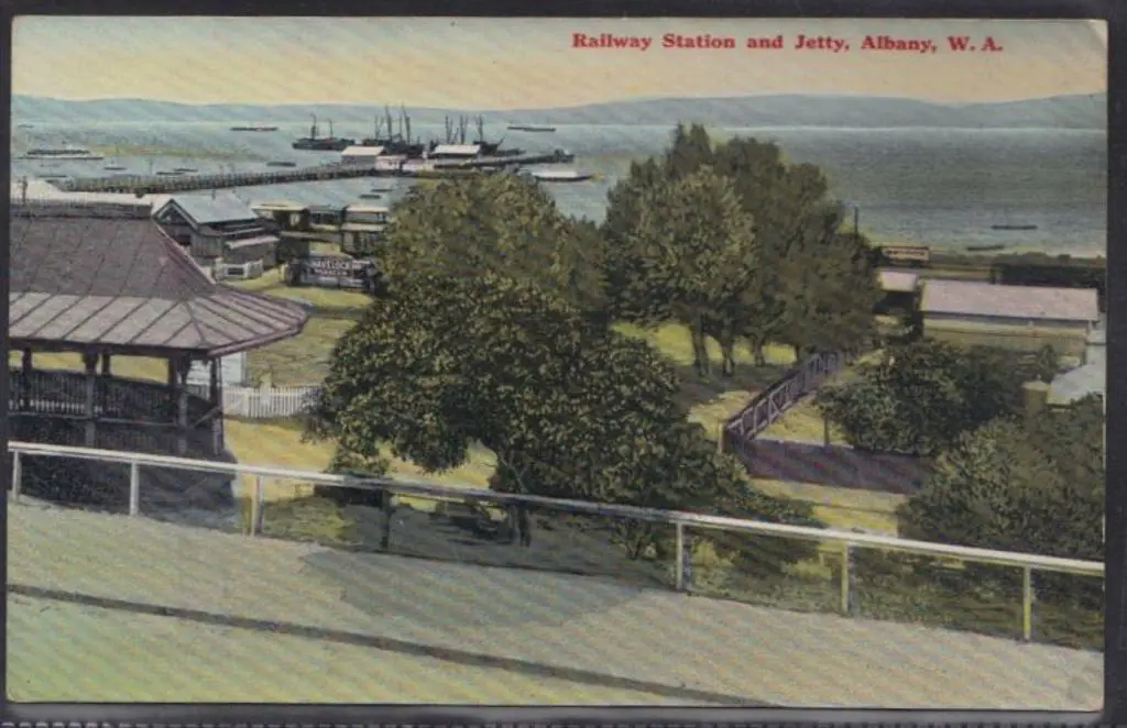 Postcard hand coloured "Railway Station & Jetty, ... Image 1++