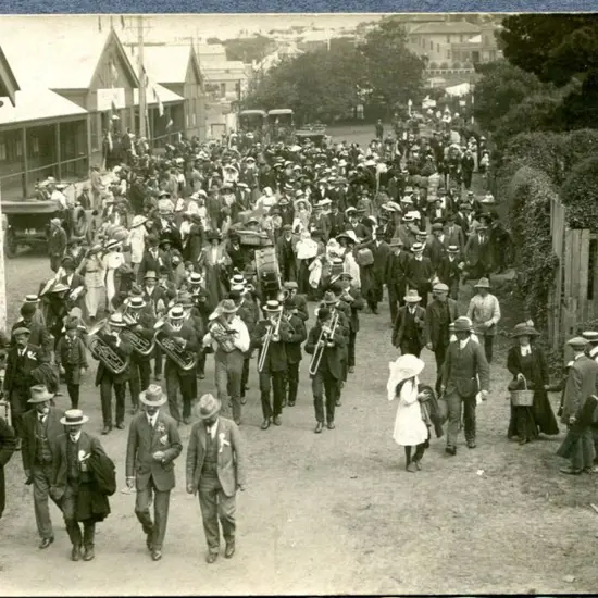 Brass band &amp; crowd of onlookers near the ...