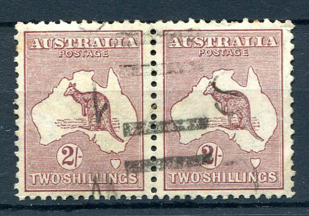 2/- maroon horiz pair with "nick left frame ... Image 1++