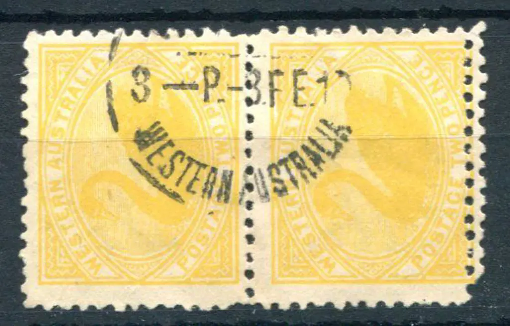 1902 2d yellow pair with double perfs at base. F/U ... Image 1++