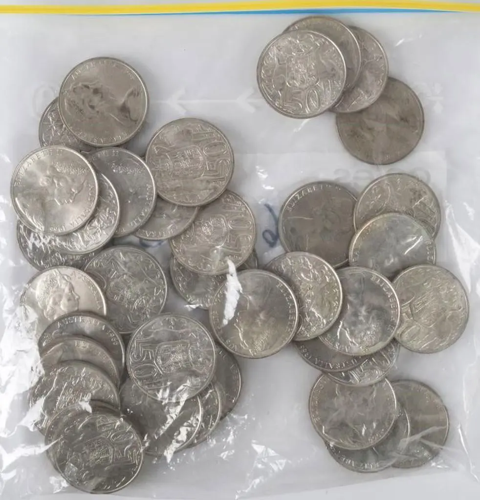 1966 50c round coins x 40 in tobacco tin. (40) Image 1++
