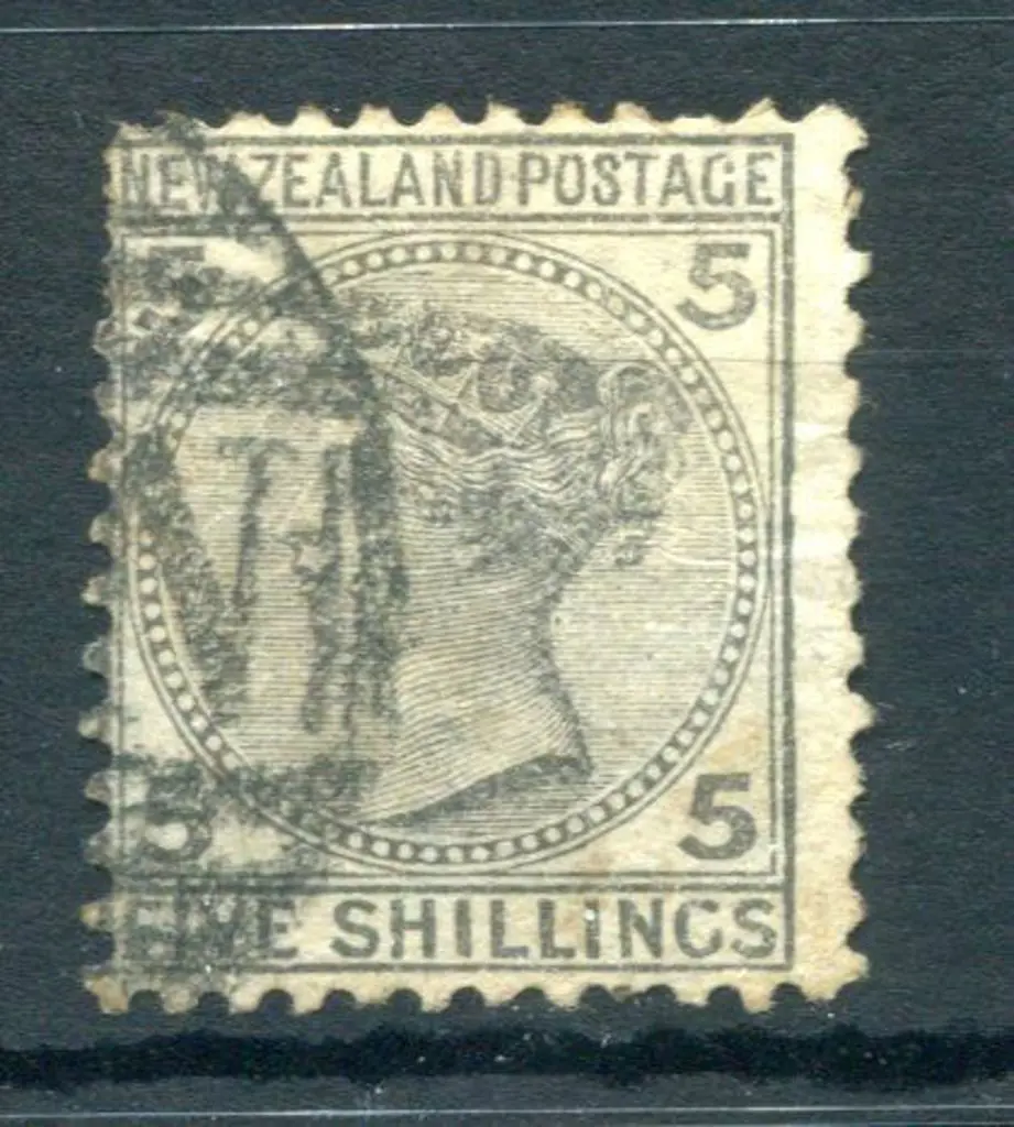 New Zealand 1878 5/- grey QV postally used. Perfs ... Image 1++