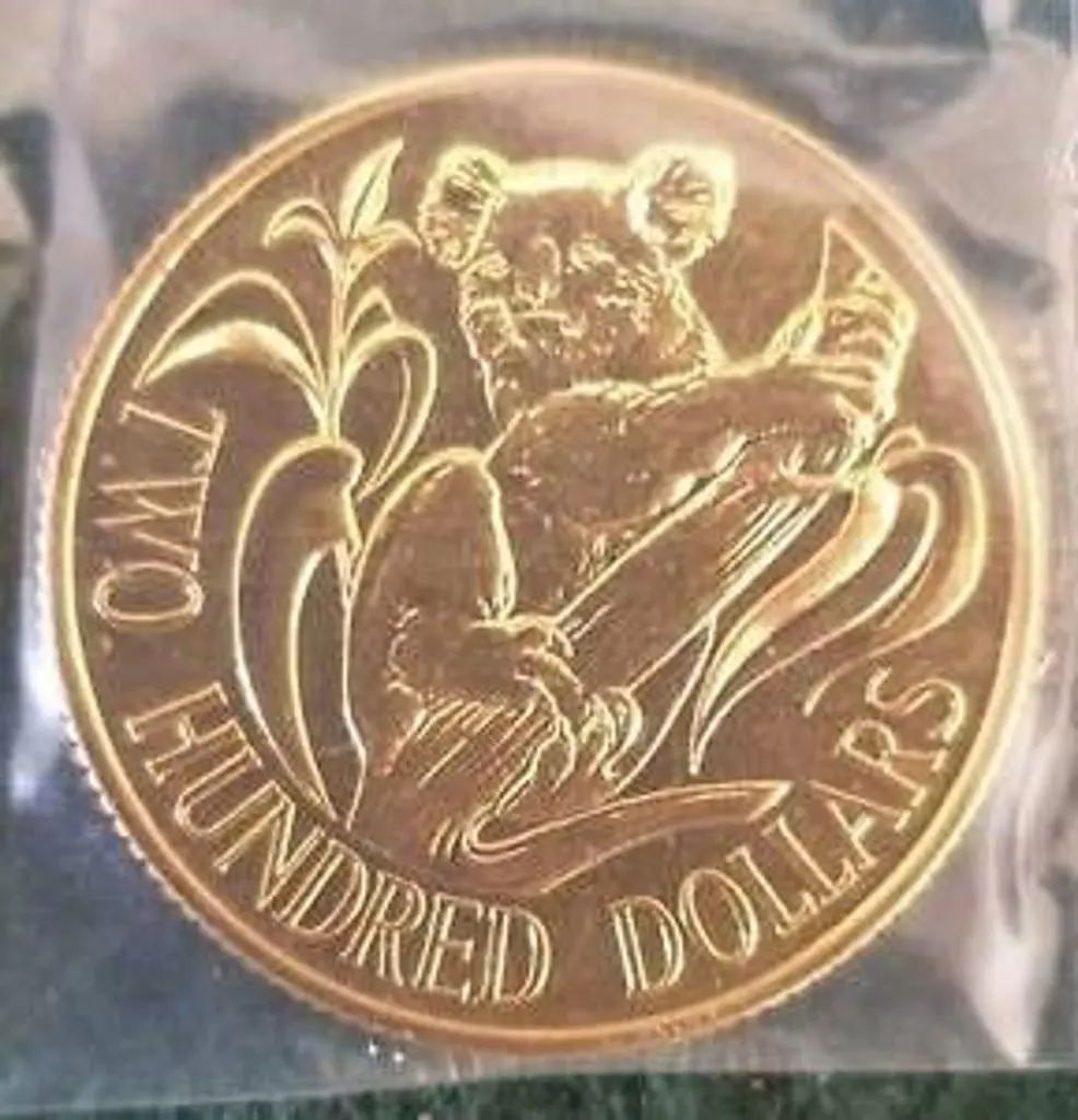 1980 $200 Koala gold coin in RAM folder. Image 1++