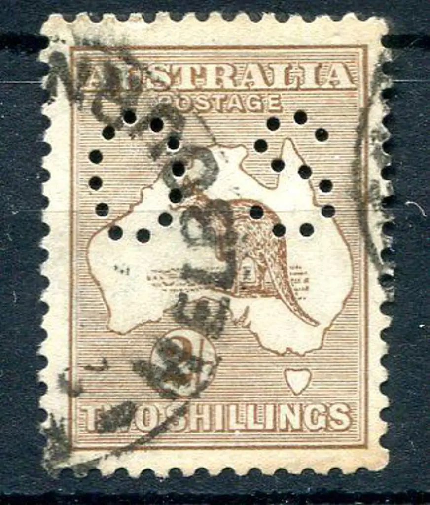 2/- brown perfined small "OS". A couple of stained ... Image 1++