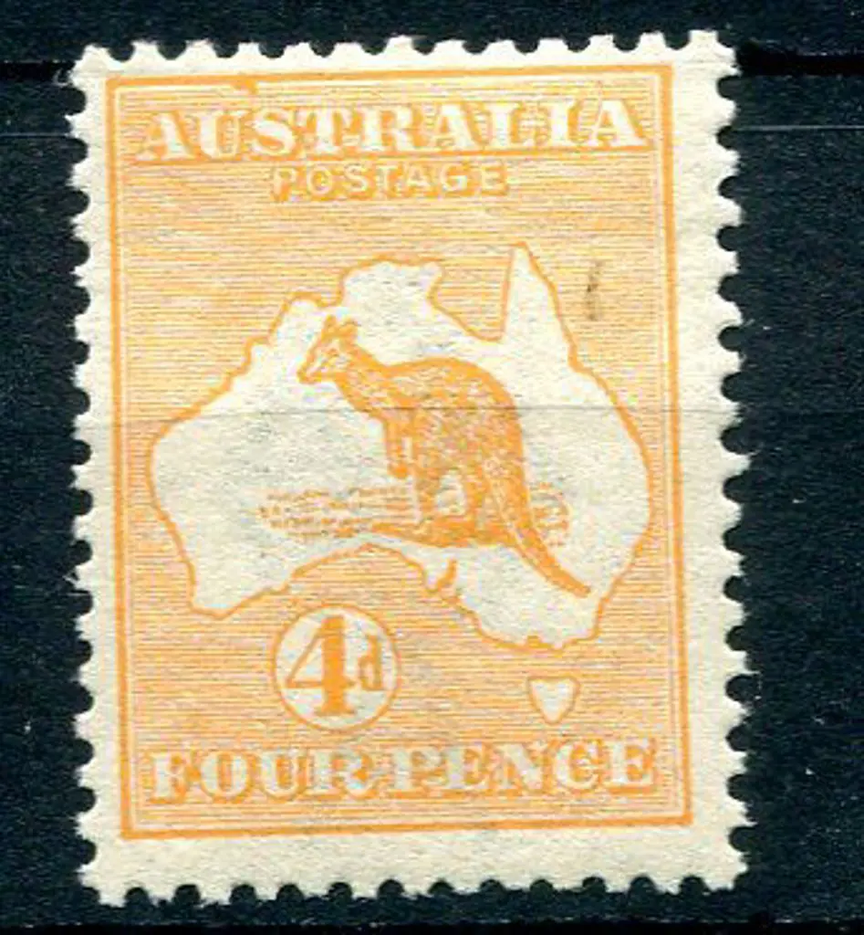 4d orange with "colour flaw to frame over "US" of ... Image 1++