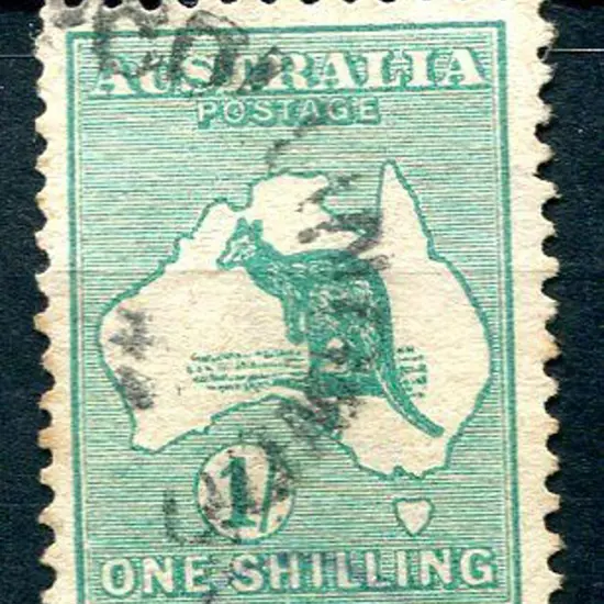 1/- blue-green with inverted wmk. One flat perf at ...
