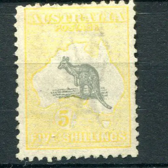 5/- grey & pale yellow. A couple of shortish perfs ...
