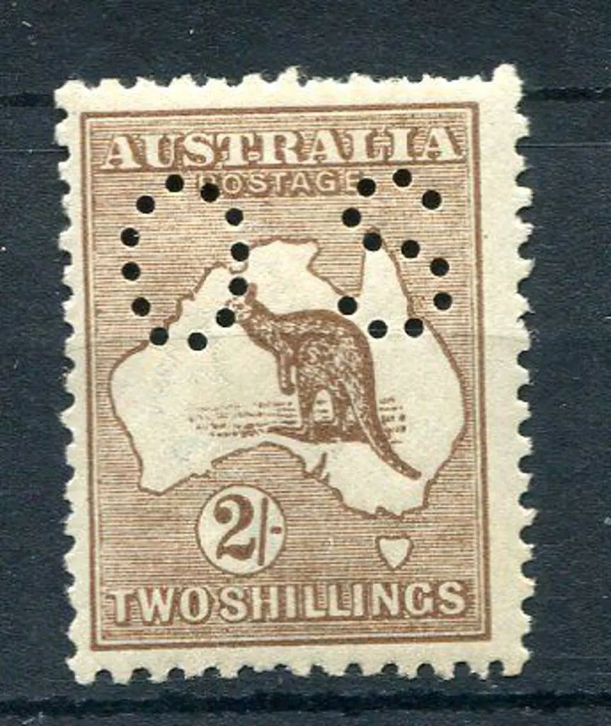 1915/28 2/- reddish-brown perfined "OS" MLH, four ... Image 1++