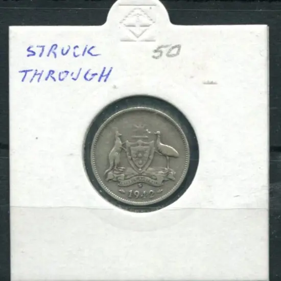 1942 Sixpence "struck through". VF