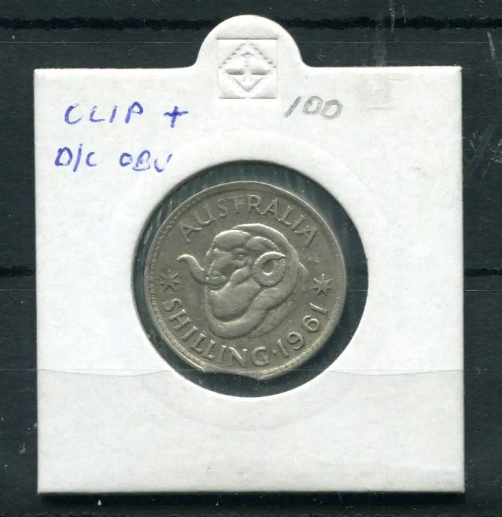 1961 Shilling with "clipped edge". VF Image 1++