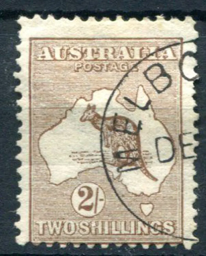 2/- brown. CTO with only "DE" visible. Fresh, ... Image 1++