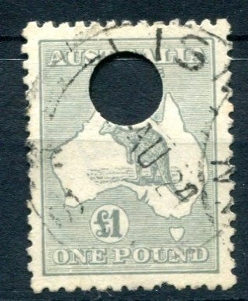 £1 grey with large Telegraph puncture. Fine used ... Image 1++