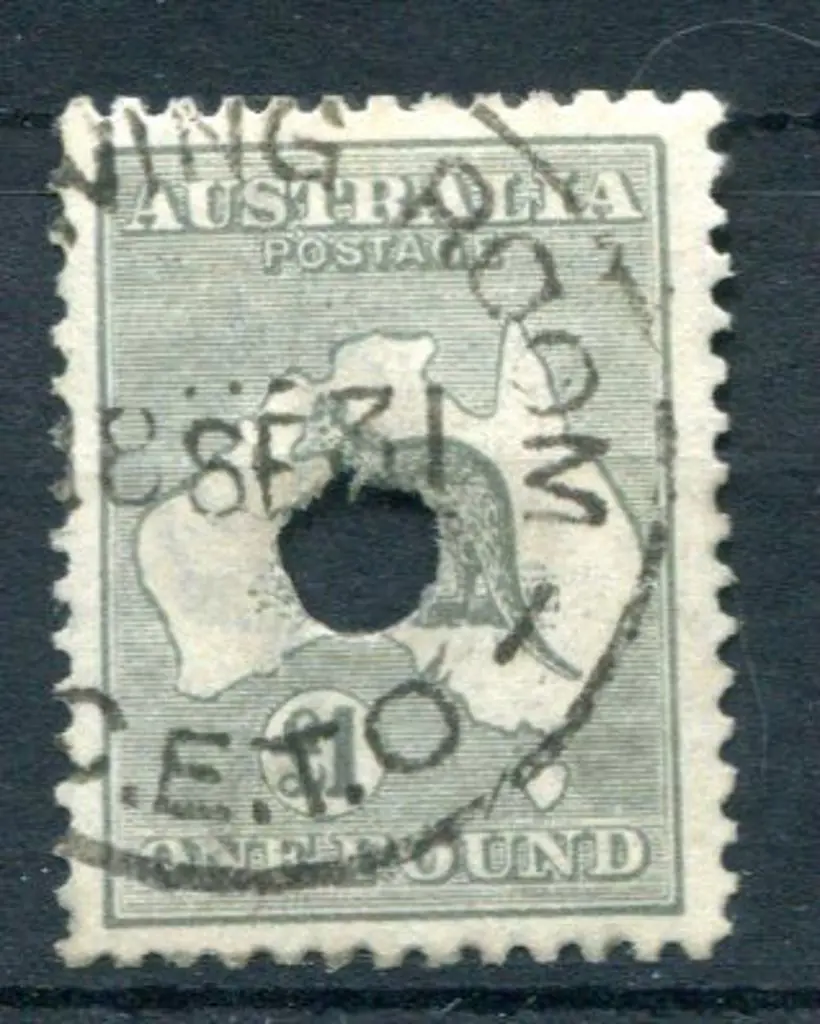 £1 deep grey with small Telegraph puncture. ... Image 1++