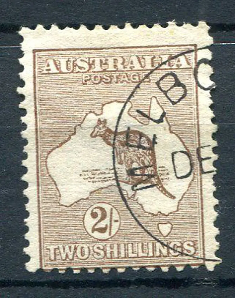 2/- brown. CTO with only "DE" visible. Fresh, ... Image 1++