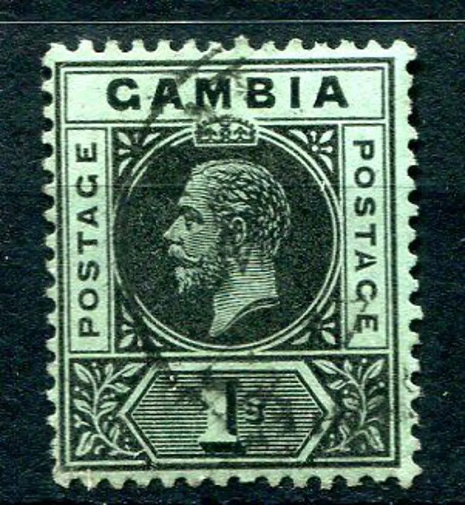 Gambia 1912 1/- black on green KGV with "split at ... Image 1++