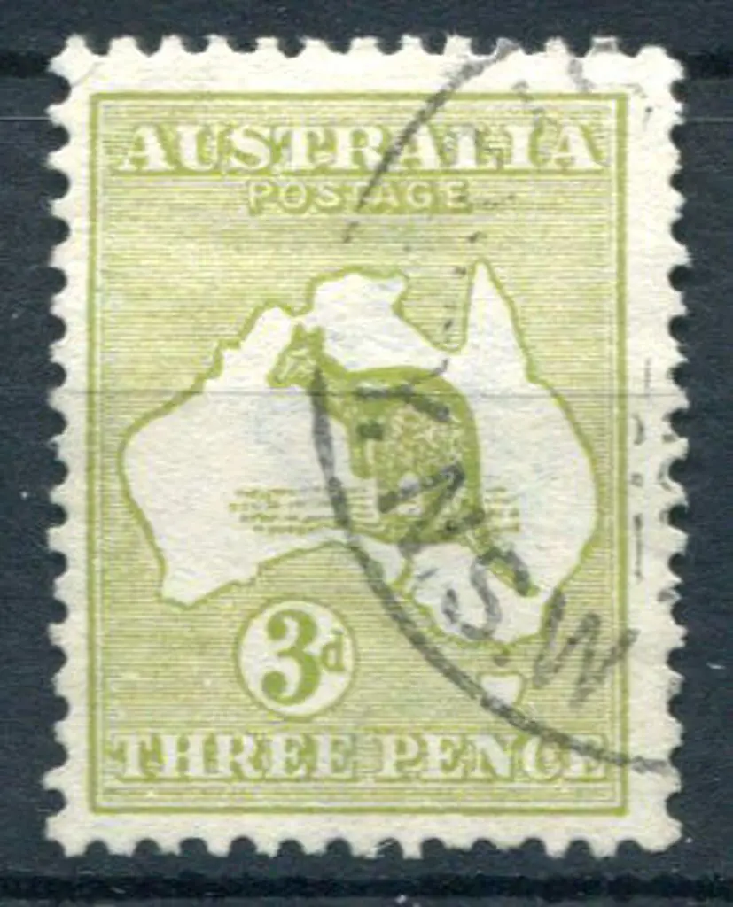 3d olive-green Die II with "white flaw over "T" of ... Image 1++