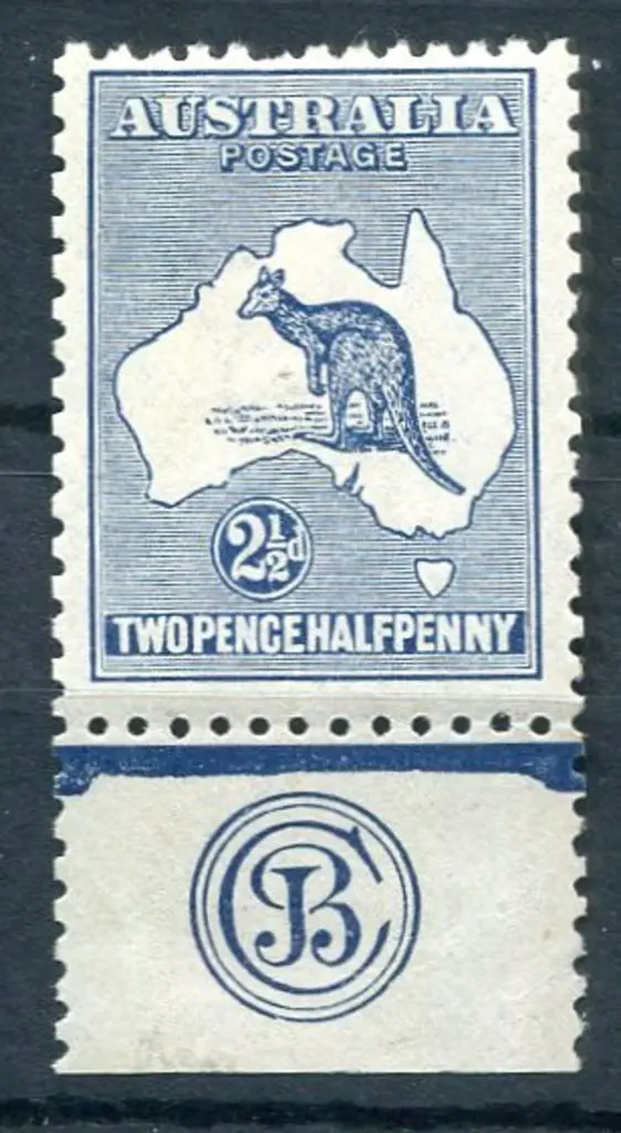 2½d blue JBC monogram single. Pulled perf at top ... Image 1++