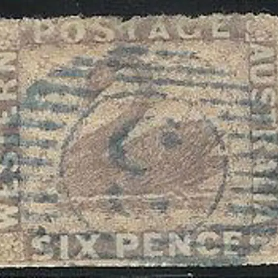 1861 6d purple on blued paper. Rough perfs but ...